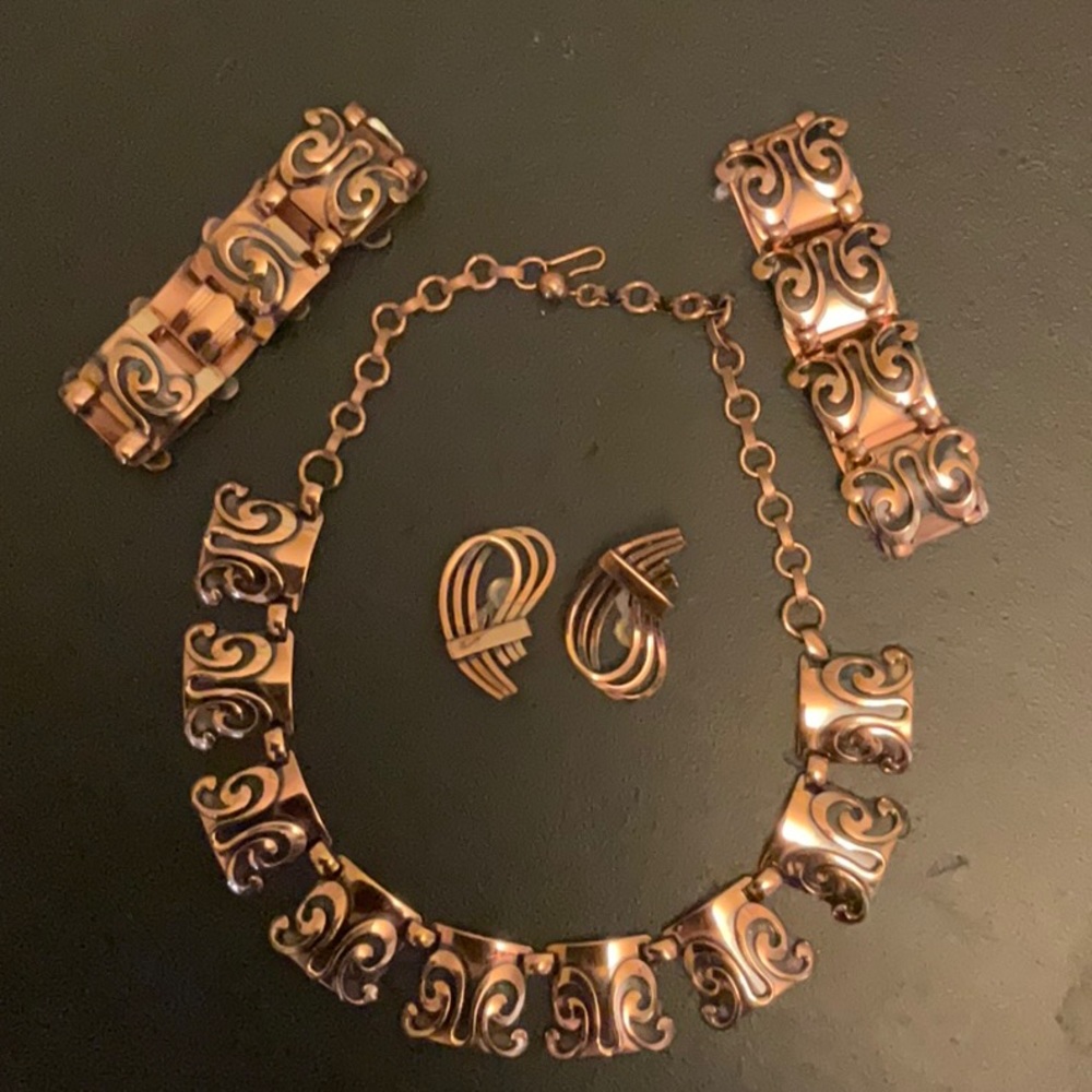 Vintage genuine copper necklace, two bracelets and clip on earrings.
